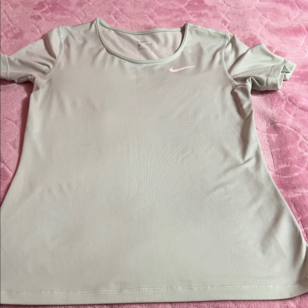 women’s nike light blue/teal shirt